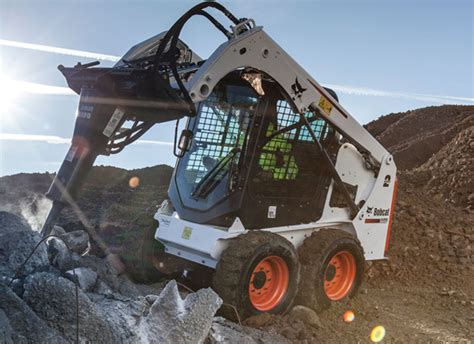 clark skid steer backhoe|clark bobcat tools.